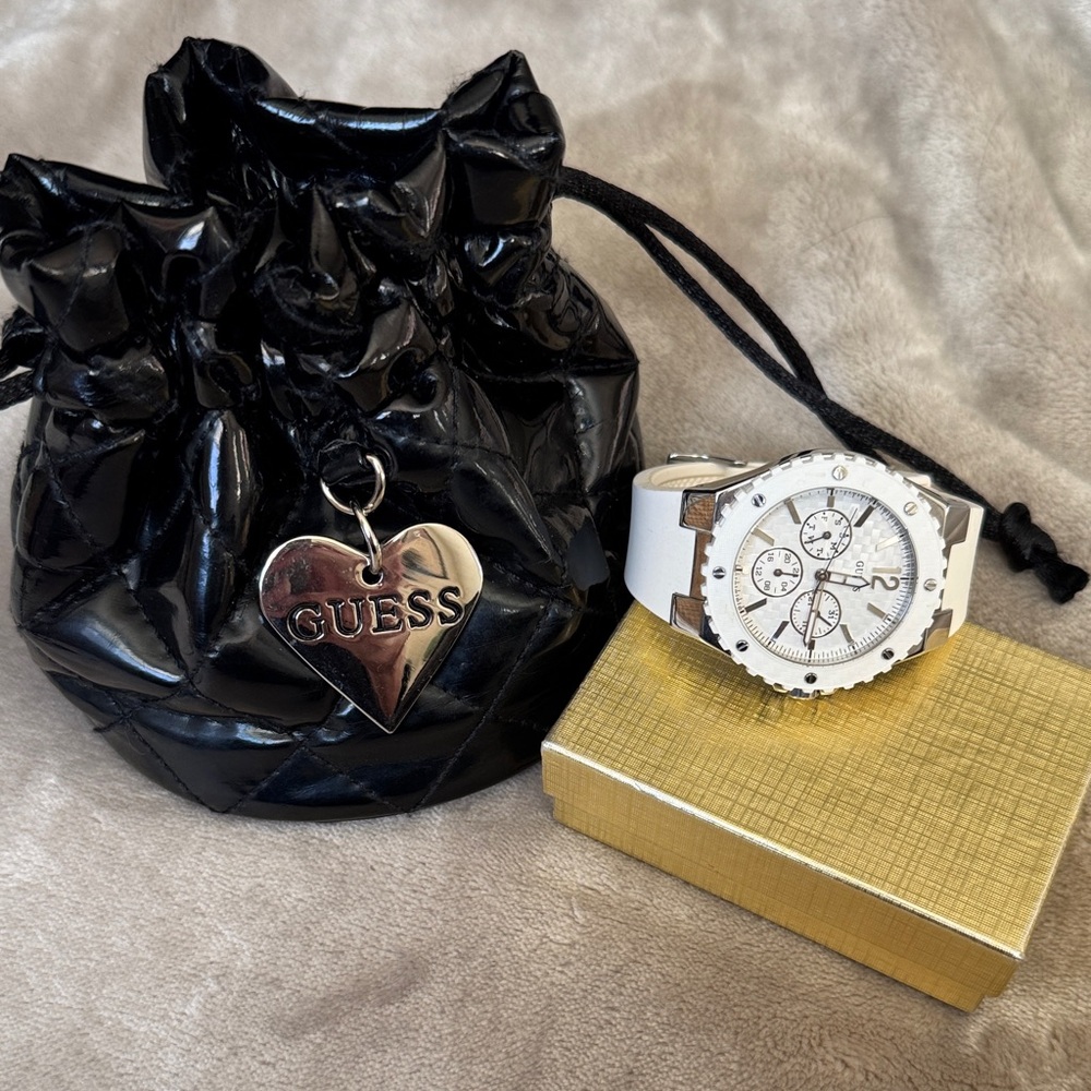 Guess Overdrive women’s Silver and White Watch with Black Pouch